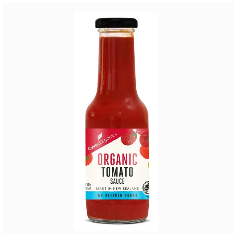 A bottle of Carea Organics Organic Tomato Sauce, 230g, featuring a red sauce inside a clear glass bottle with a black cap and a white label.