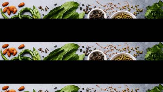 Selection of fresh organic fruit, vegetables, nuts and grains arranged on a table, representing organic food and organic fruit and veg delivery in Brisbane