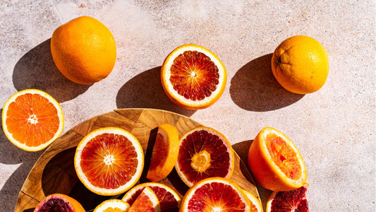 Fresh  blood orange slices on chopping board