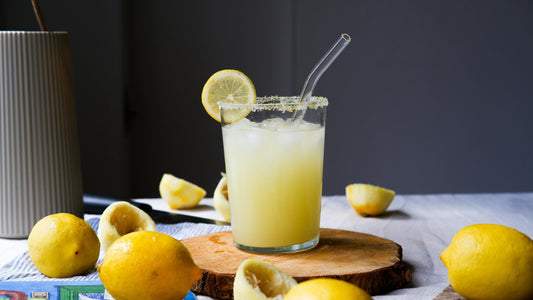 Lemons and lemonade on a table