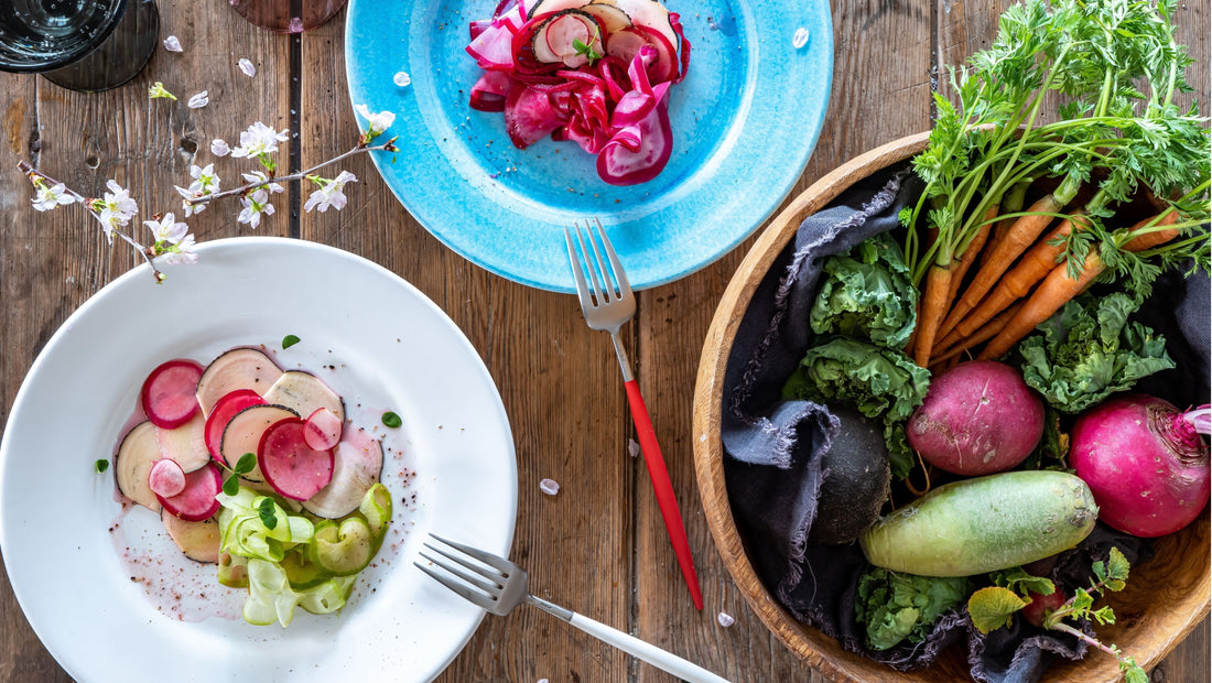 Beets and other vegetables in bowls and plates