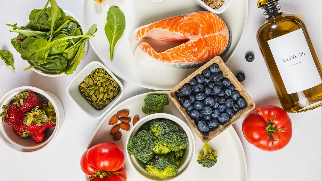 Anti-inflammatory foods like organic berries, fresh broccoli, tomatoes, wild-caught salmon, cold-pressed olive oil, nuts and seeds.