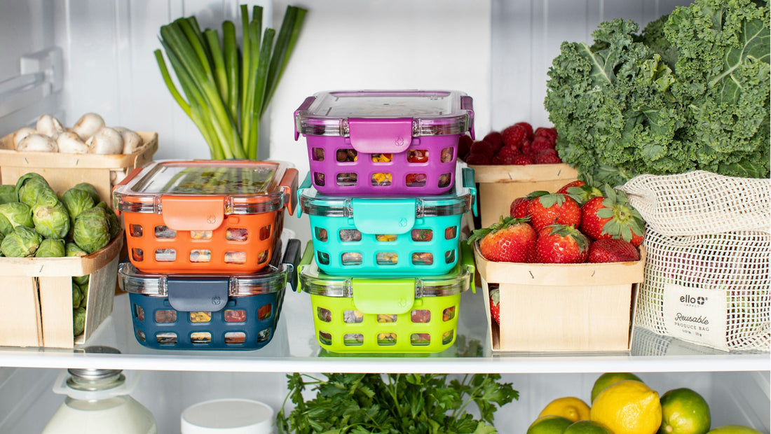 Organised fridge with fresh seasonal produce, reusable containers and organic fruits and vegetables, showing practical food storage tips to reduce waste and save money on healthy eating.