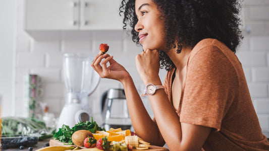 Mindful eating with fresh seasonal produce, showcasing whole food nutrition and simple healthy eating habits that support overall wellbeing.