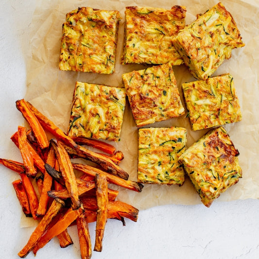 Easy Zucchini Slice with Veggie Fries on a white background