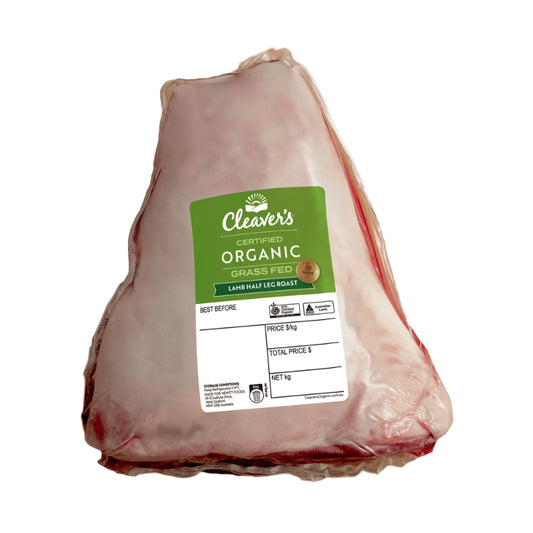 A packaged half rack of lamb meat on a white background, with a green and white Cleaver's Organic Grass Fed label on the front.