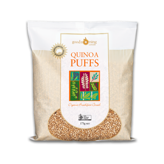A 175g bag of Good Running Cereal Quinoa Puffs on a white background. The packaging is white with beige vertical stripes on the sides, featuring a central white label with orange text and a colorful botanical grid.