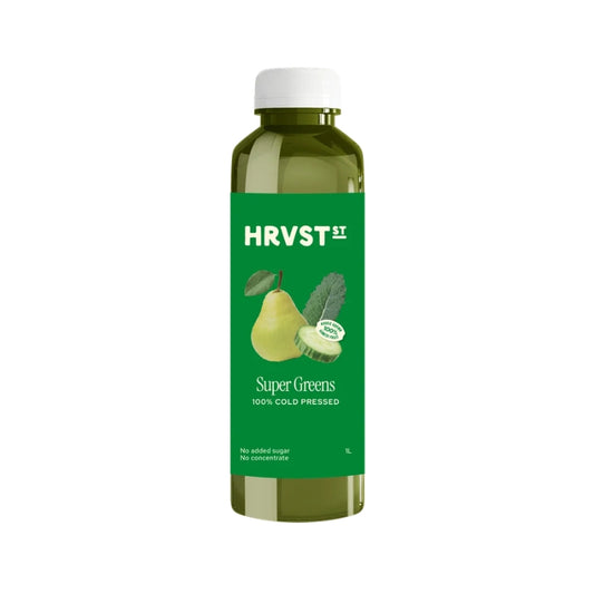 A 500ml bottle of HRVST II Super Greens juice concentrate, featuring a green label with pear and kale illustrations, on a solid white background.
