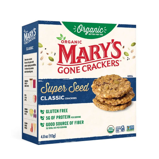 A box of Mary's Gone Crackers Classic with Super Seed flavor, featuring a white and navy blue design with a photo of three stacked crackers on the front.