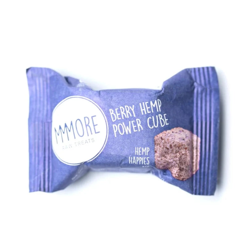 A single MMORE pet treat cube in its wrapper, labeled 'Berry Hemp Power Cube' and 'Hemp Happyies', on a plain white background.