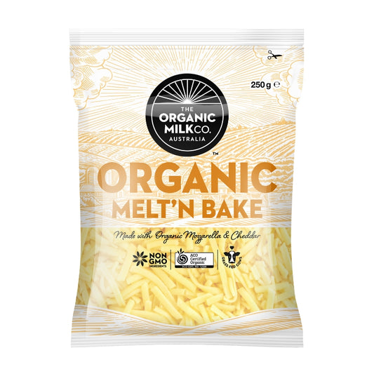 A 250g bag of The Organic Milk Co. Organic Melt 'N Bake cheese, featuring a cream and gold design with a black circular logo and a clear window showing shredded cheese inside.